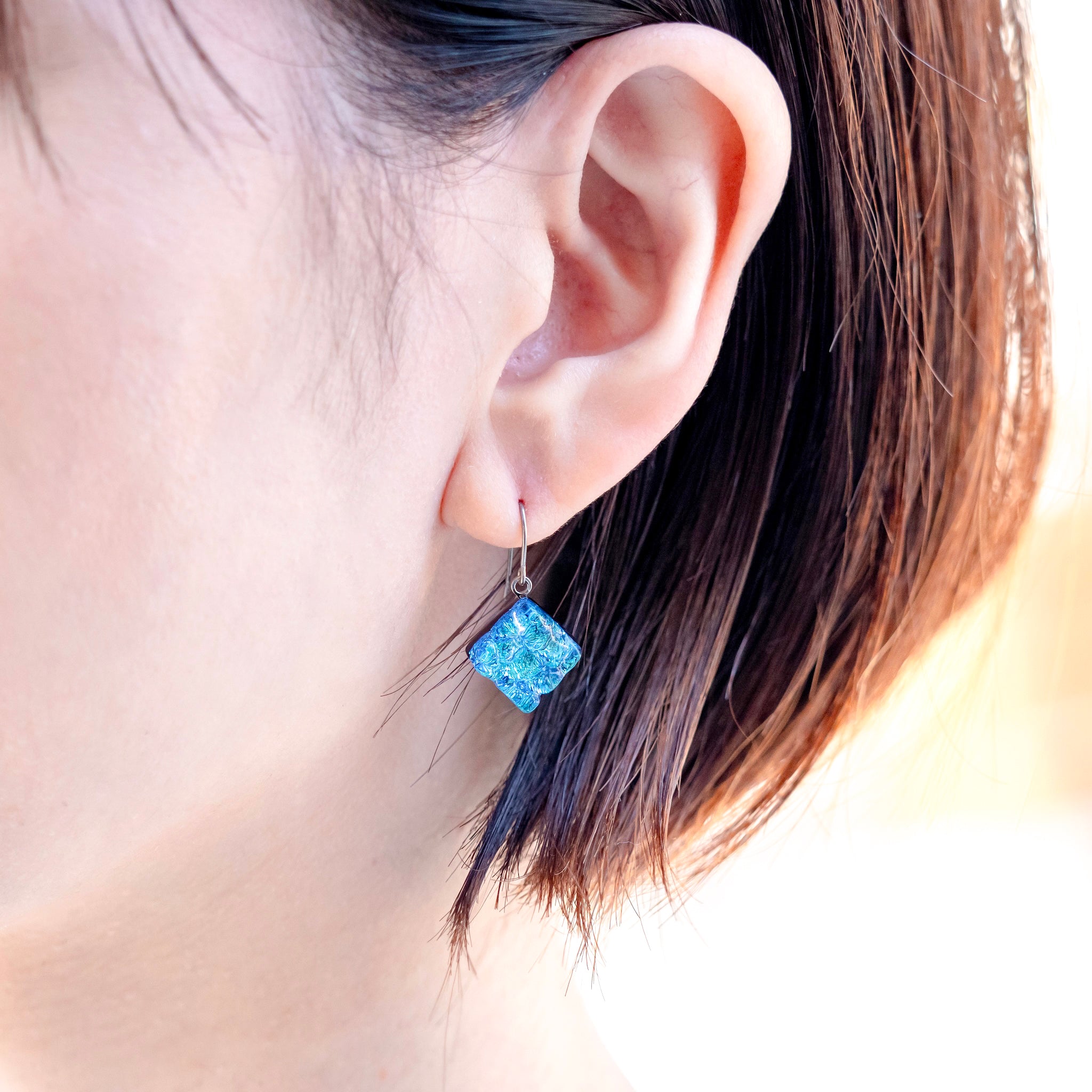 リフレクト ピアス (スイング・スタッズ) ライトブルー